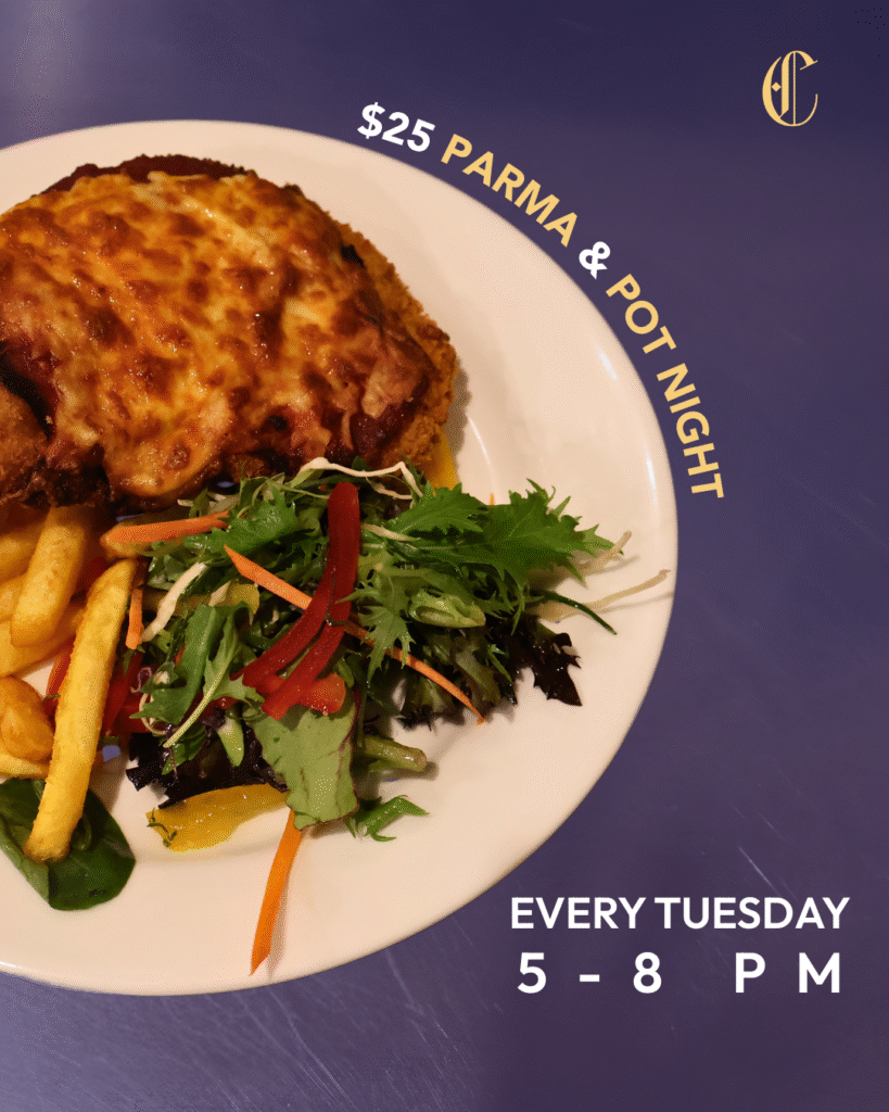 Chicken parma with golden chips, salad, and a free pot of beer at The Courthouse Hotel Smythesdale.