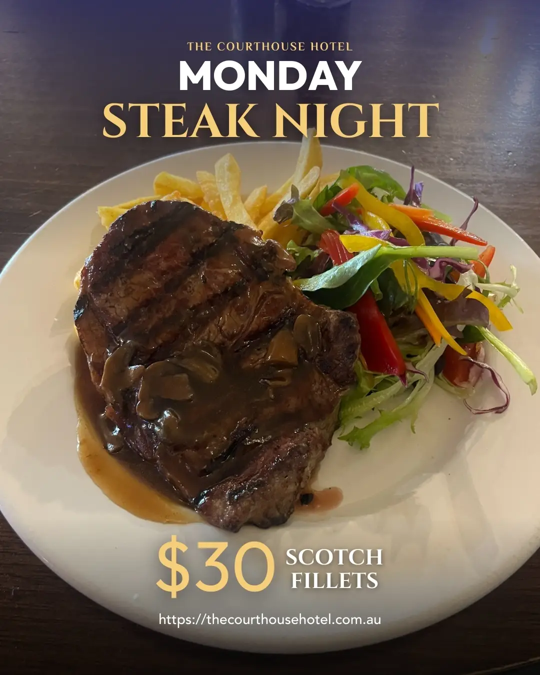 $30 scotch fillet steak with chips and salad on a plate at The Courthouse Hotel Smythesdale Monday Steak Night.